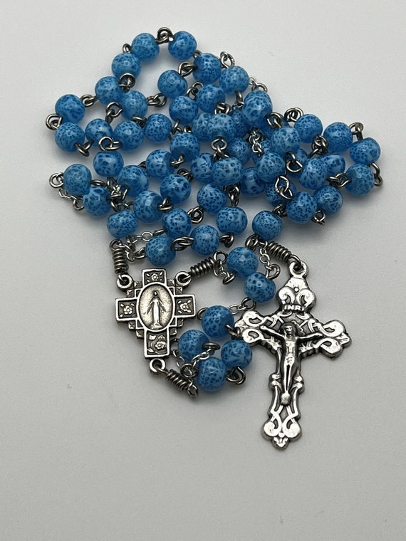 19" blue speckled bead rosary with 4 way Miraculous Medal center