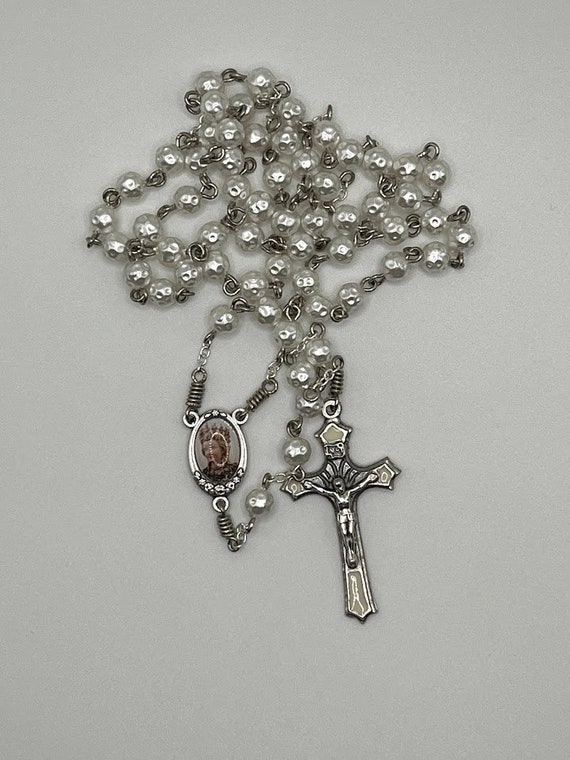 20" white dappled bead rosary with St Agatha center and white enamel crucifix