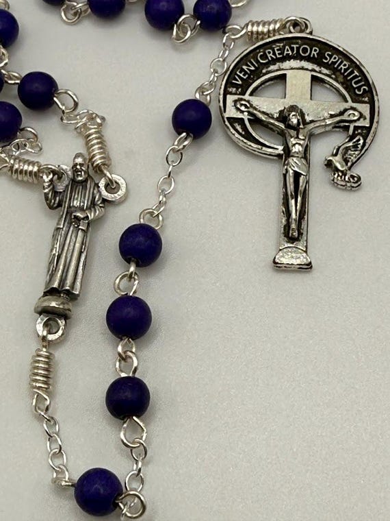 27.5 indigo bead 7 decade crown rosary with  Padre Pio center and veni creator spiritus crucifix