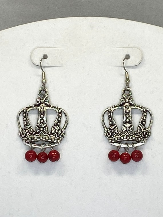 Crown earrings with red or purple accent bead