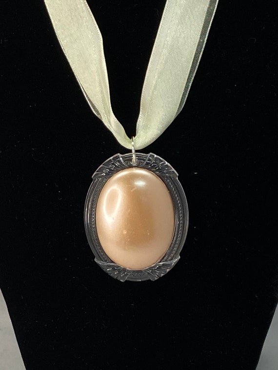 19" peach pearl pendant on cream ribbon