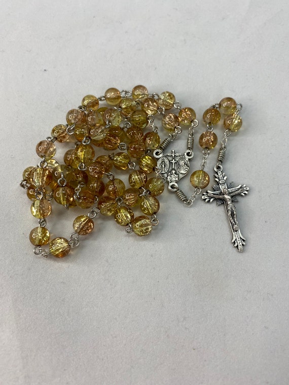 21.5" brown/green crackle bead rosary with 4-way center and sunburst crucifix