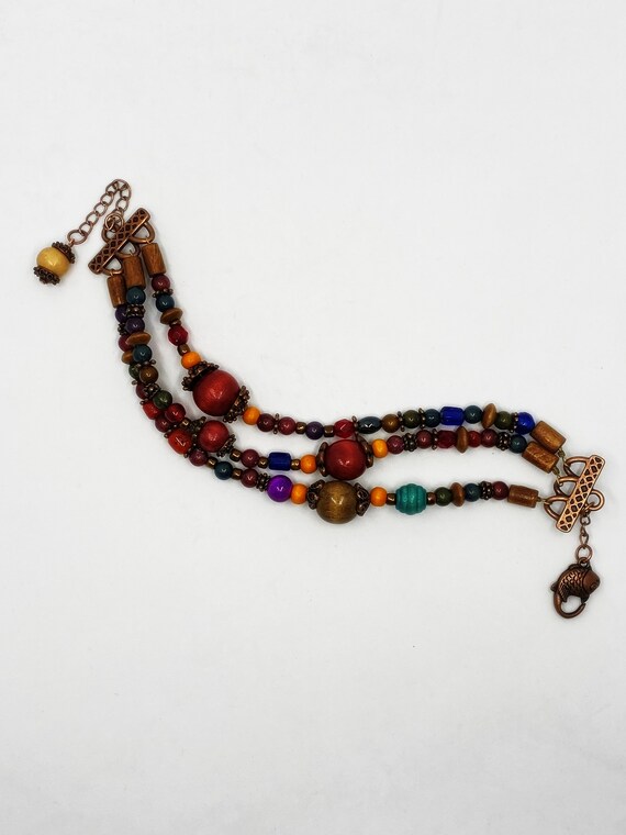 7.5" copper and wood 3 strand bracelet with 2" extender