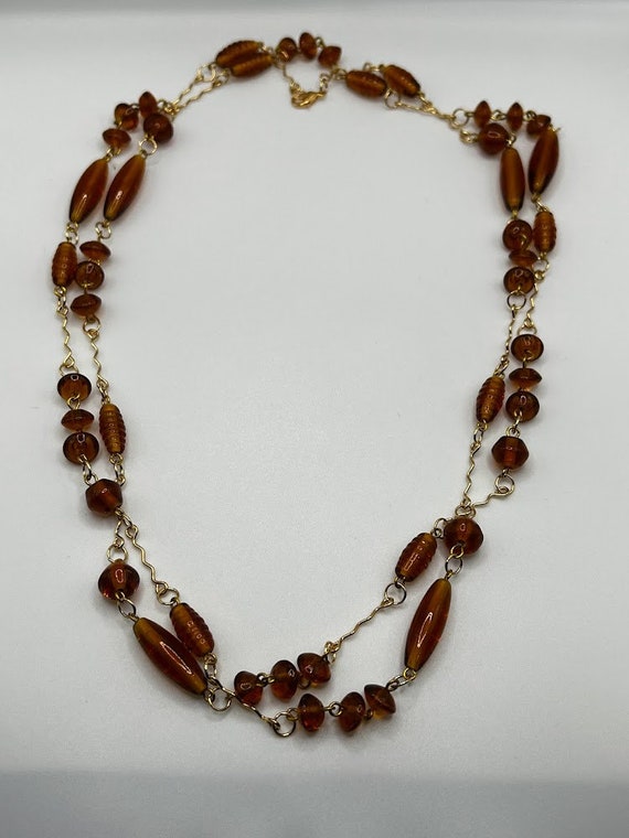 70" brown glass and gold necklace