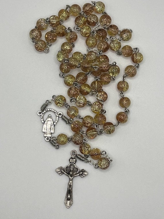 21.5" yellow/brown crackle glass bead rosary with IHM center and chalice crucifix