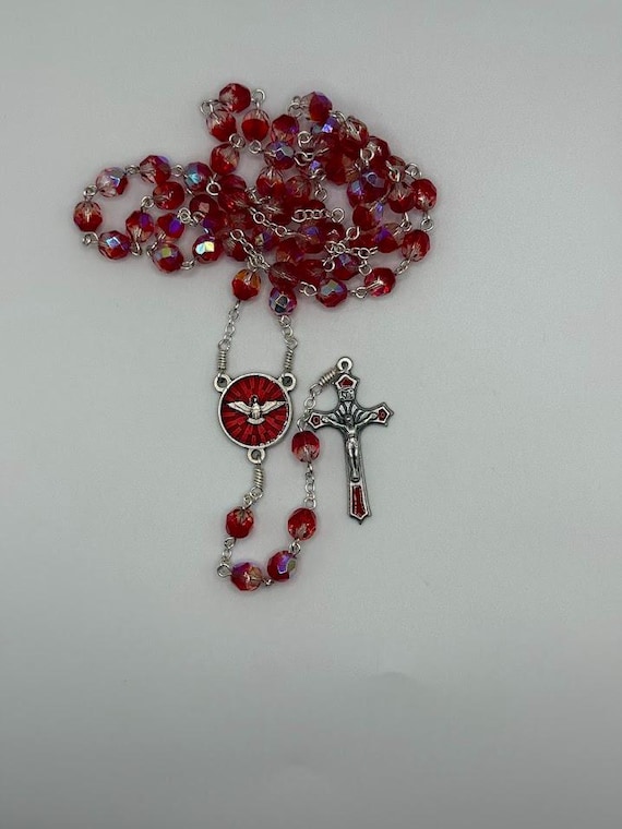 24.5" red/clear faceted glass bead rosary with Holy Spirit center and red enamel inlay crucifix