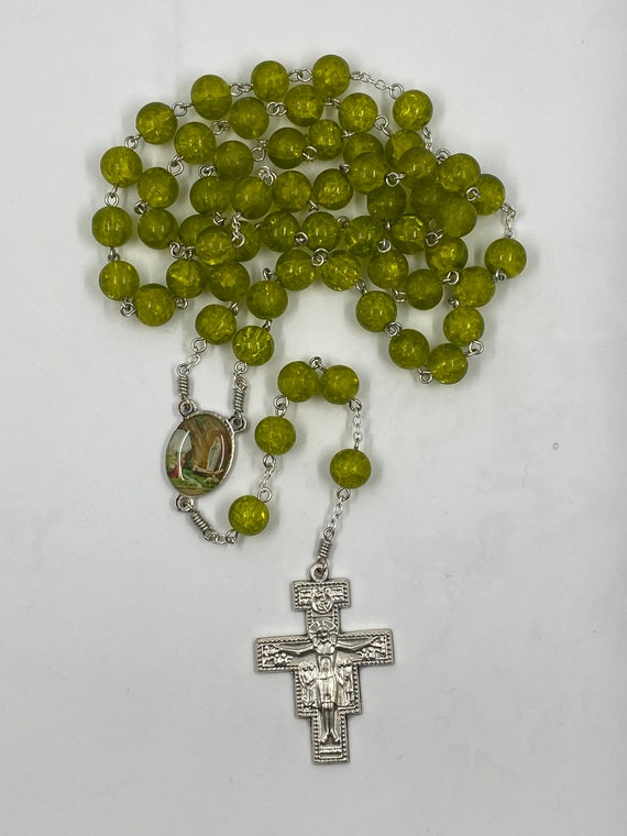 26" green crackle glass bead rosary with enamel Lourdes center and San Damiano crucifix