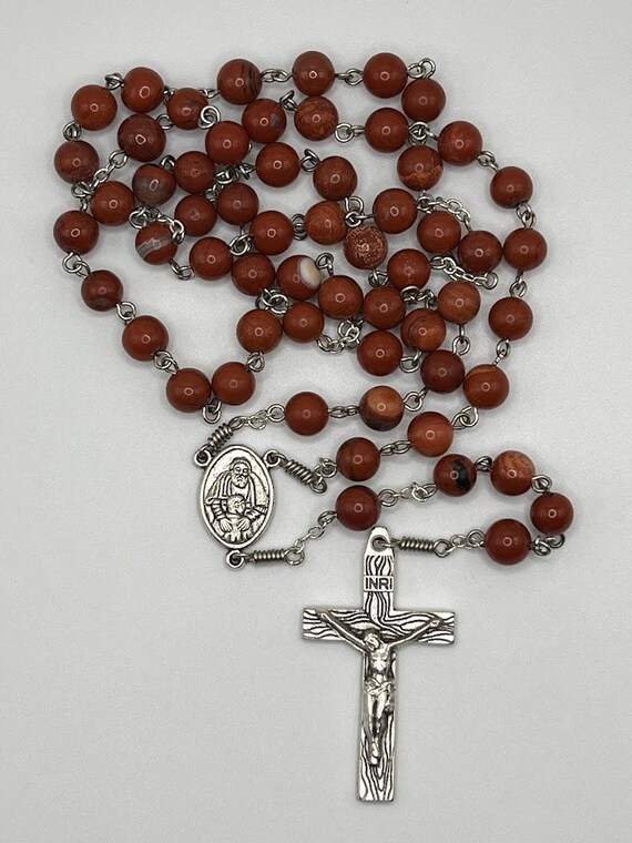 24.5" red jasper bead rosary with Got the Father center and woodgrain crucifix