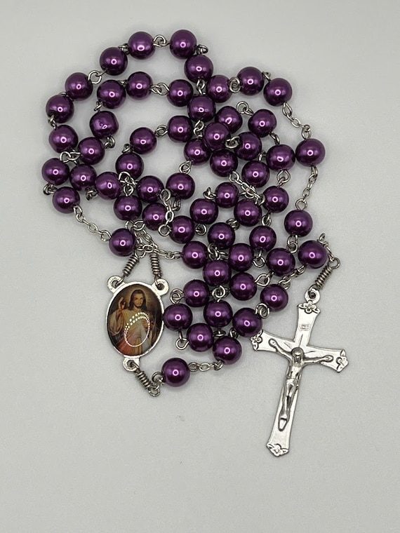 23.5" purple pearl rosary with Divine Merce center and floral acent crucifix