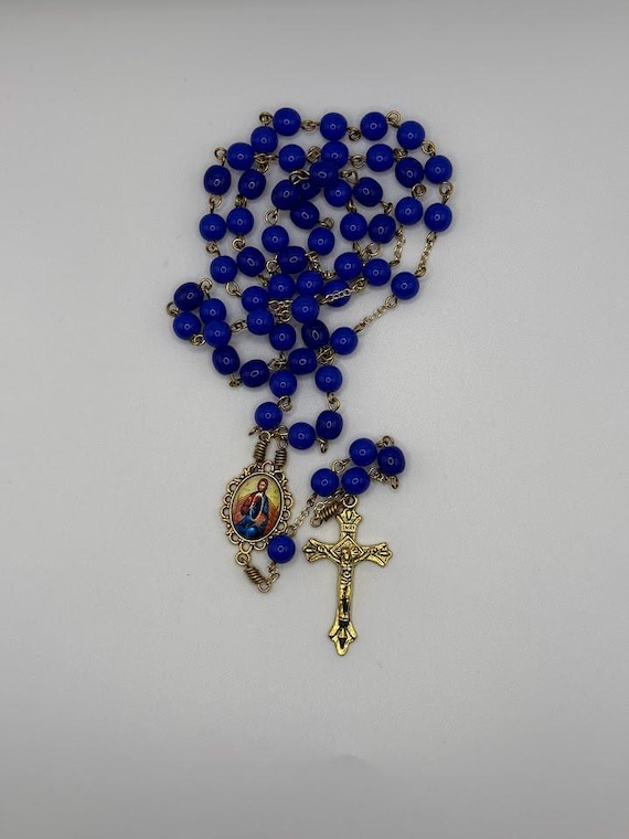 24.5" blue glass bead rosary with Jesus the Teacher center and fluted tip crucifix