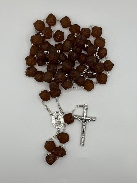 31.5" brown bead rosary with St Francis center and slanted ends crucifix