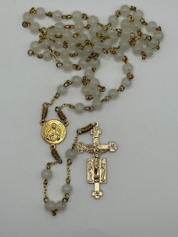 21.5" white glass bead rosary with Miraculous Weeping Madonna relic center and Adoring Angels crucifix