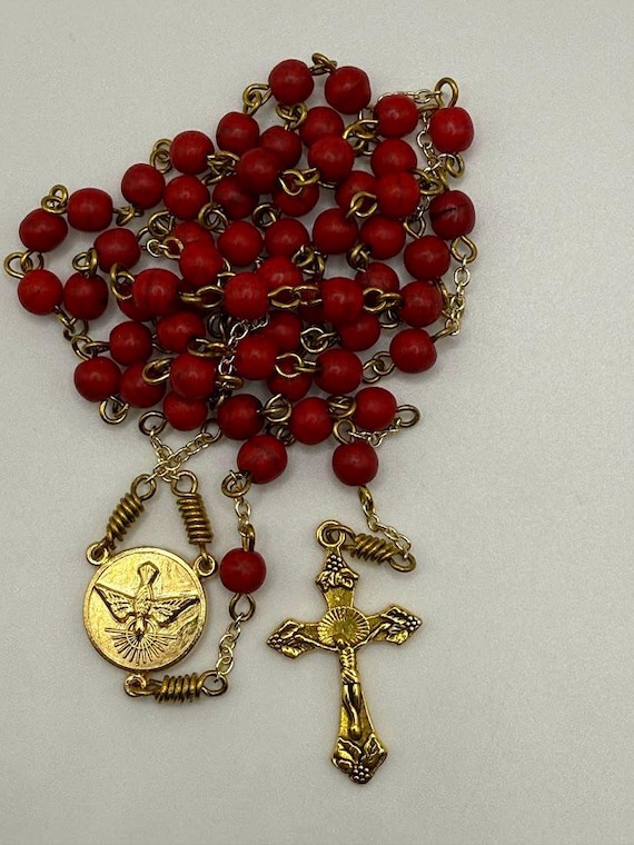 20.5" red howlite bead rosary with Holy Spirit center