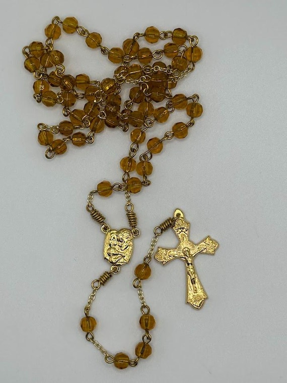 21" dark honey glass bead rosary with Holy Family/Holy Spirit center