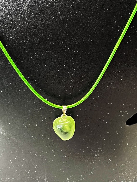 18" green cat eye pendant on green cord