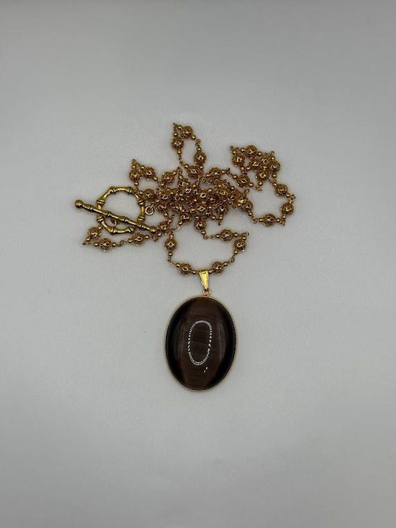 28.5" brown cat's eye glass pendant necklace