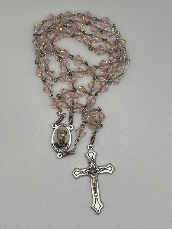 24.5" peach Swarovski crystal rosary with St Agatha center and indented crucifix