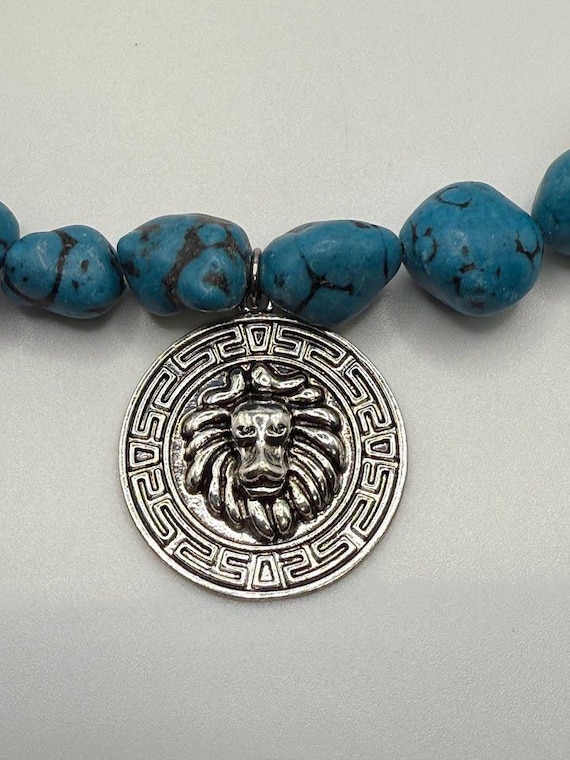 23.5" turquoise nugget necklace with coin pendant