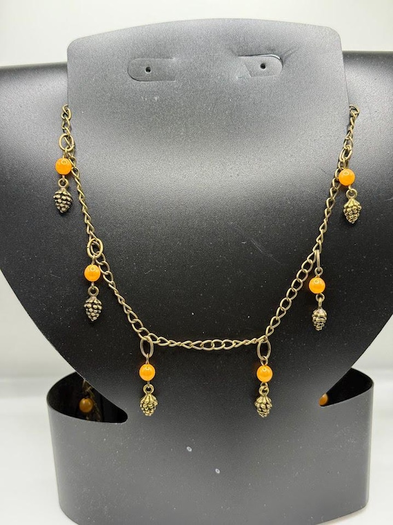 28" peach glass and brass pinecone necklace