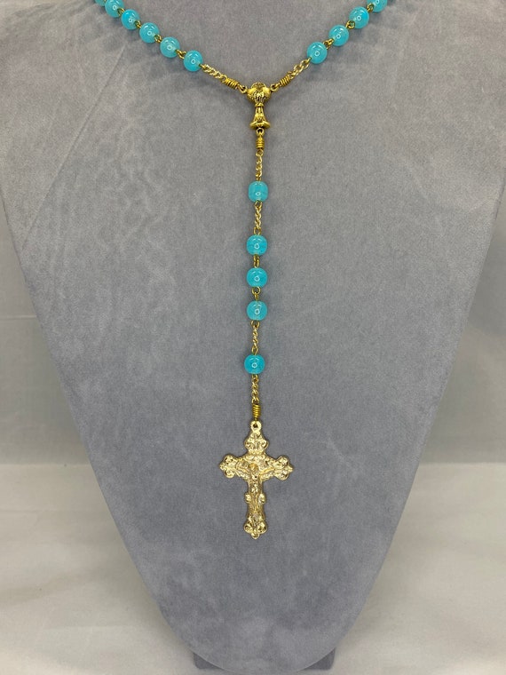22.5" teal glass bead rosary with chalice center and fancy crucifix