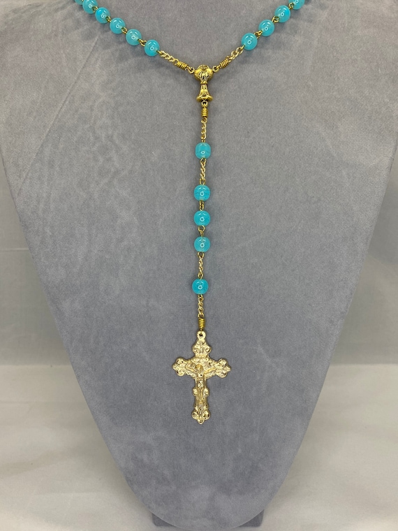 22.5" teal glass bead rosary with chalice center and fancy crucifix