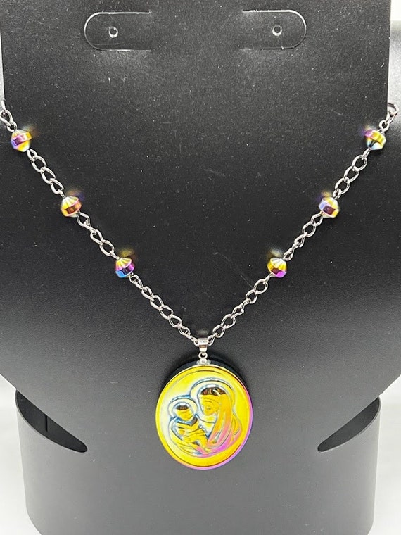 21" rainbow coated hemalyke Madonna and child pendant