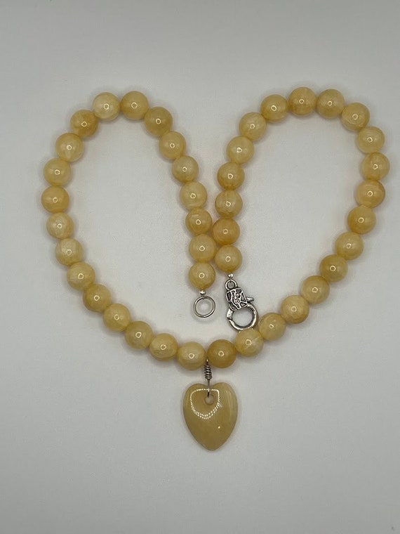 20.5" golden calcite heart pendant beaded necklace