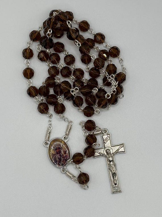 25" brown crystal bead rosary with Czestochowa center and mission crucifix