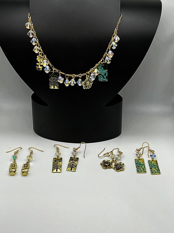 21" crystal and floral charm necklace and earring set