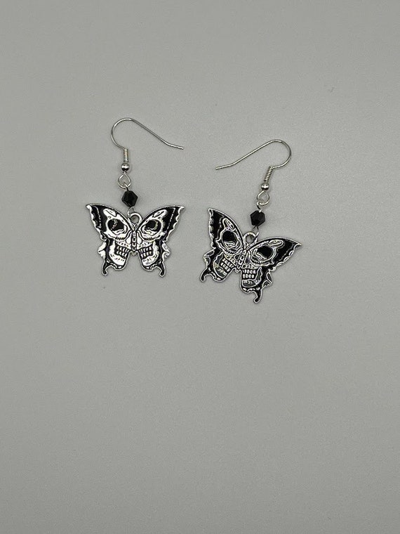 Butterfly skull earrings