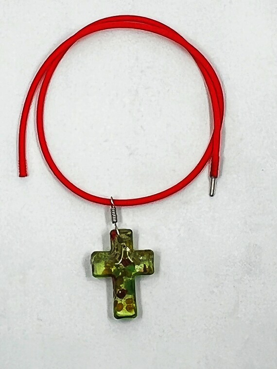 20" lampwork glass green cross on red rubber cord