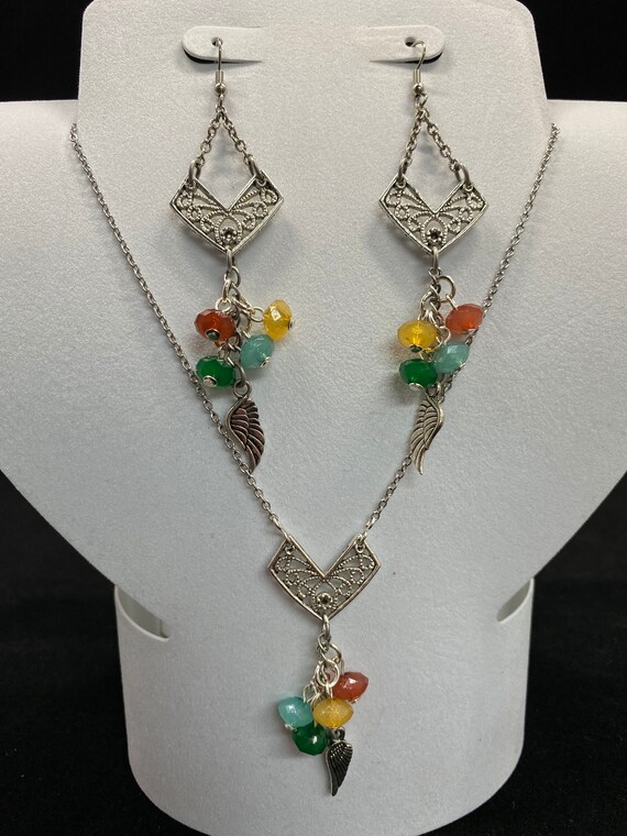 20" multi color bead and feather necklace and earring set