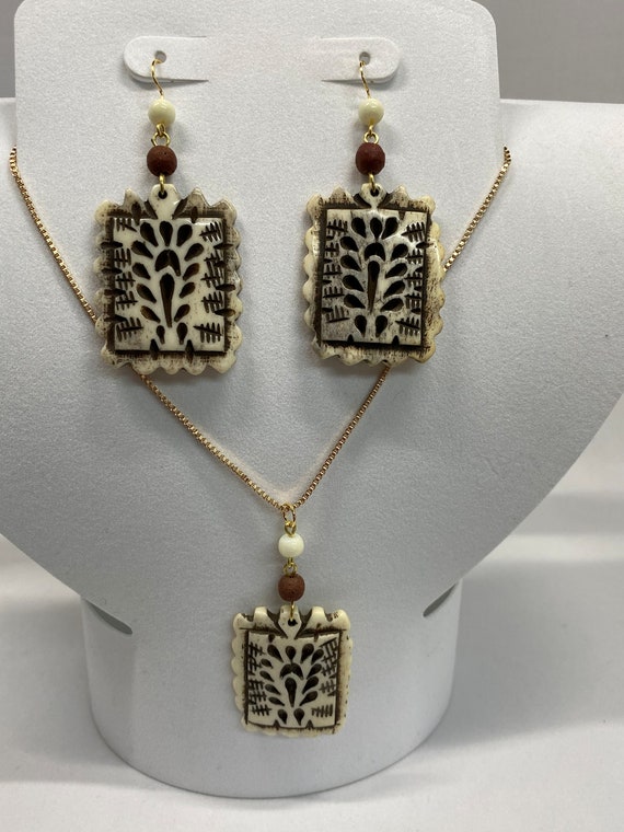 21" bone pendant and earrings set