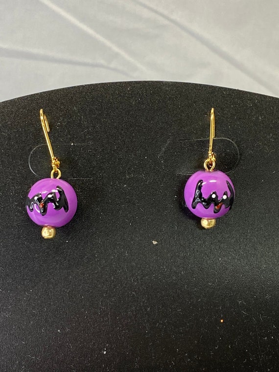 Hand painted purple and black bat earrings