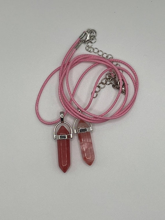 Pink glass pendant on 18" pink g cord with silver lobster clasp and 2" in chain extender