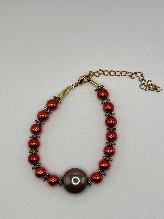 7.5" orange beads bracelet