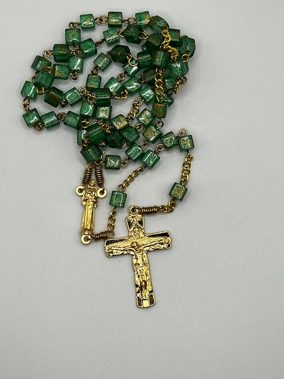 22" green and gold glass cube bead rosary with Madonna statue center and Trinity crucifix