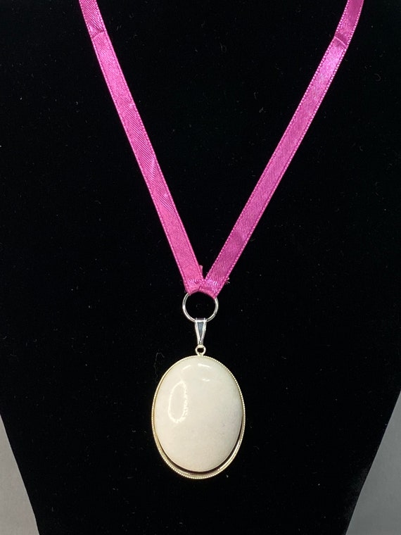 16" snowy quartz pendant on pink ribbon