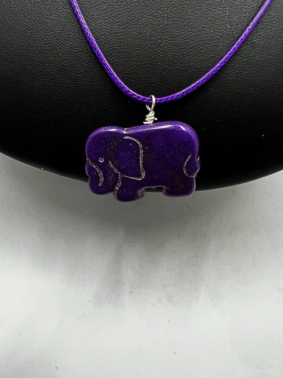 18" carved howlite elephant drop pendant on waxed colored cord