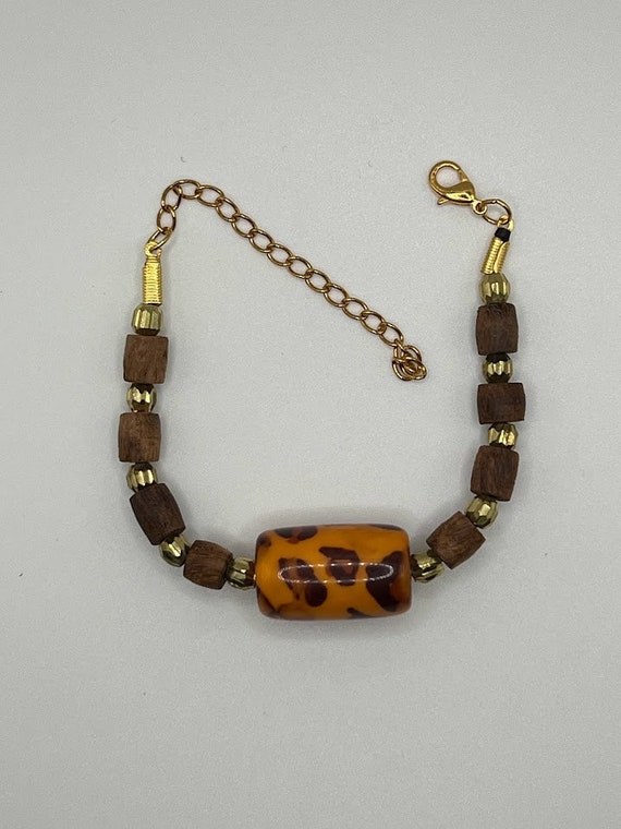 7" brown wood and gold barrel bracelet