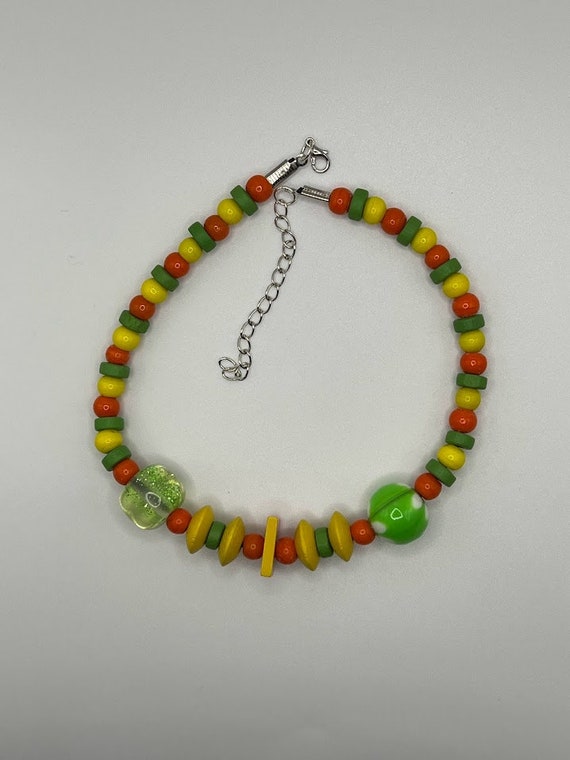 13" green, yellow, and orange bead wraparound bracelet