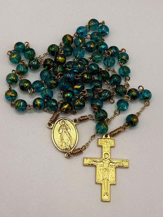 23" blue and gold glass bead rosary with Divine Mercy center and San Damiano crucifix