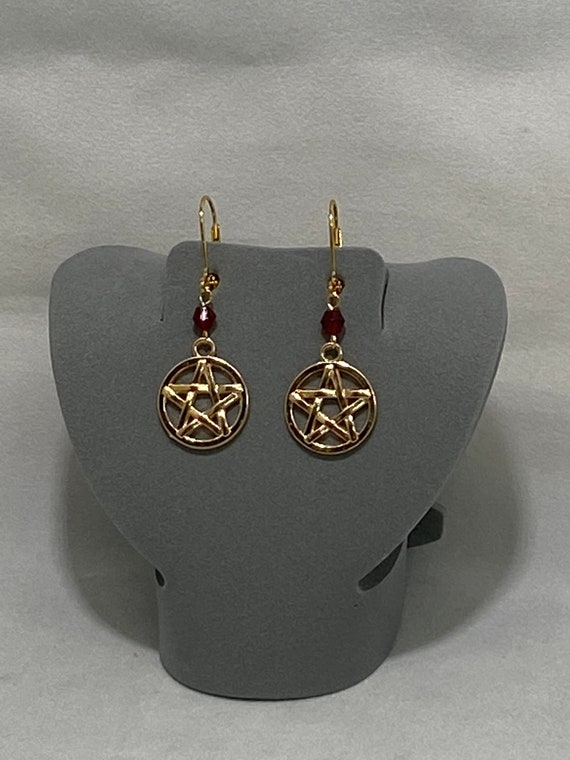 Gold pentacle earrings