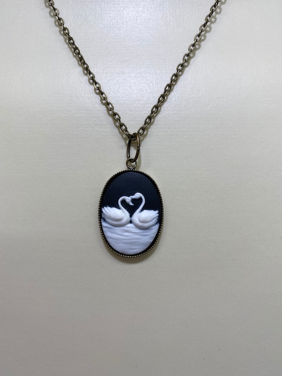 18" swans cameo pendant on brass