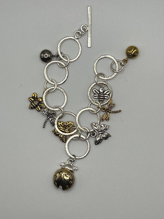 7.5" silver and gold insects charm bracelet