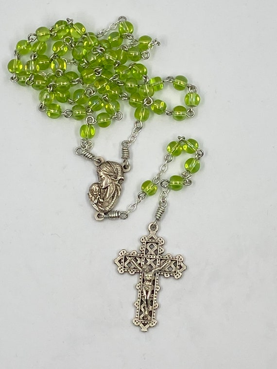 19" green glass bead rosary with Madonna and Child center