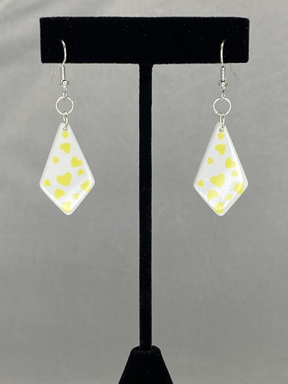 White and yellow acrylic drop earrings