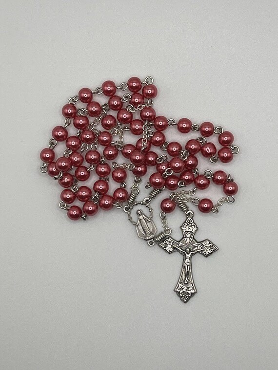 19" dark pink bead rosary with Madonna center and grapes crucifix