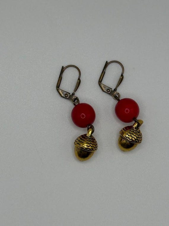 Acorn and red bead earring