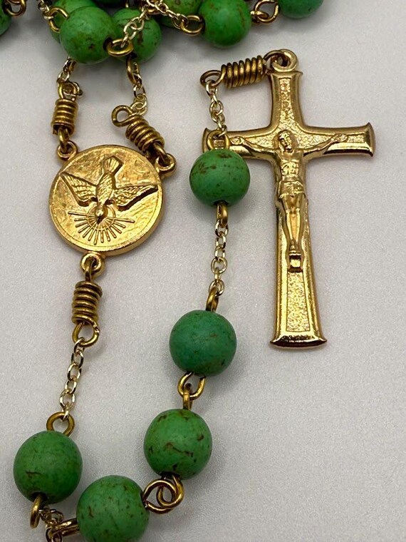 23.5" green howlite bead rosary on gold with Holy Spirit center and textured crucifix